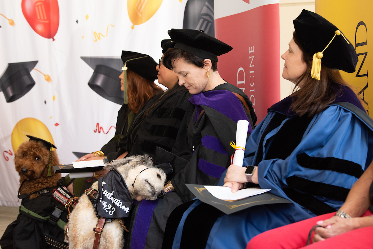 UMB Honors Service Dogs with ‘Dogtorate’ Degrees