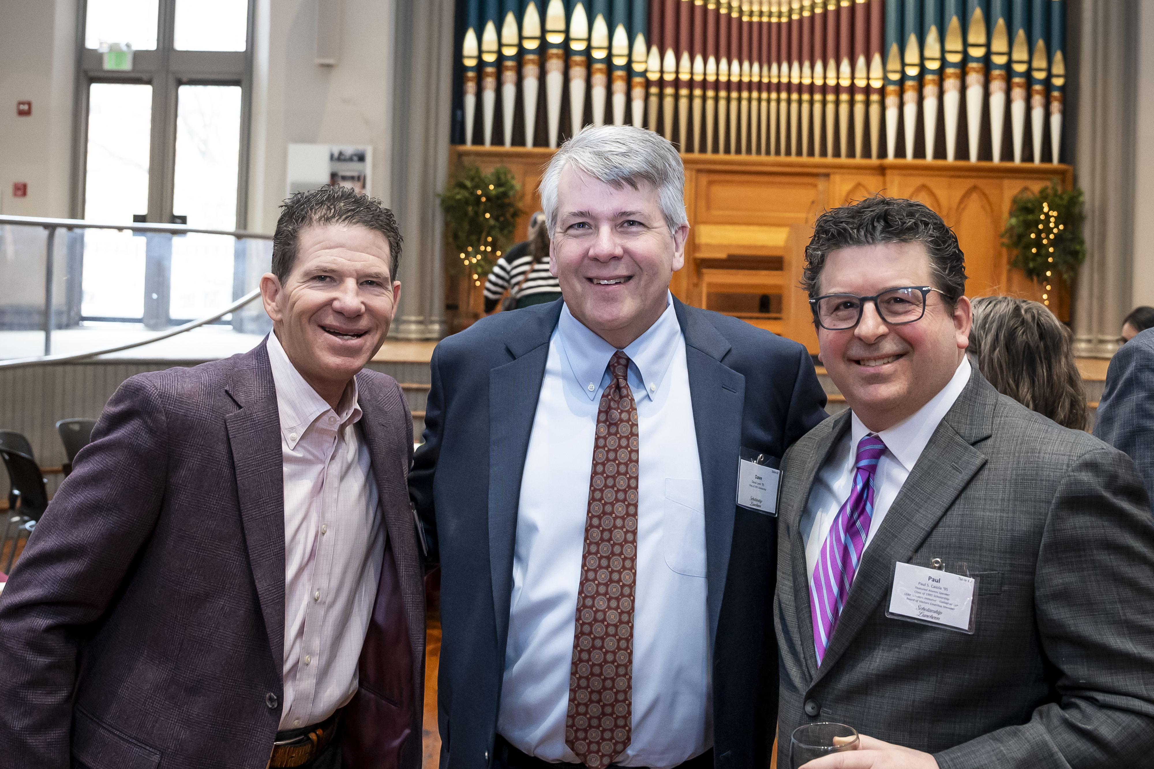 Three Board of Visitors members at the 2026 Scholarship Luncheon in Westminster Hall