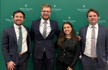 Students posing for a photo at the Tulane Professional Football Negotiation Competition