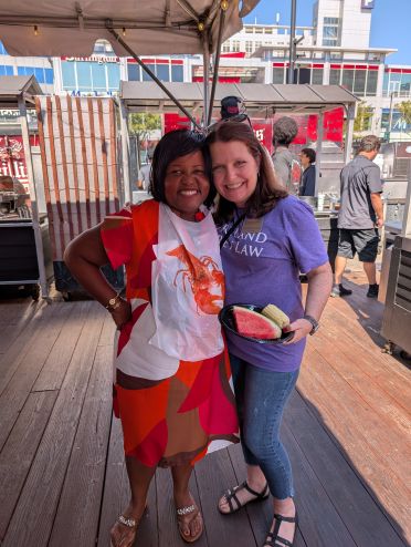2 people at an outdoor crab feast
